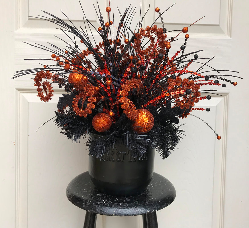 Orange and Black Trick or Treat Black Cauldron Halloween Centerpiece